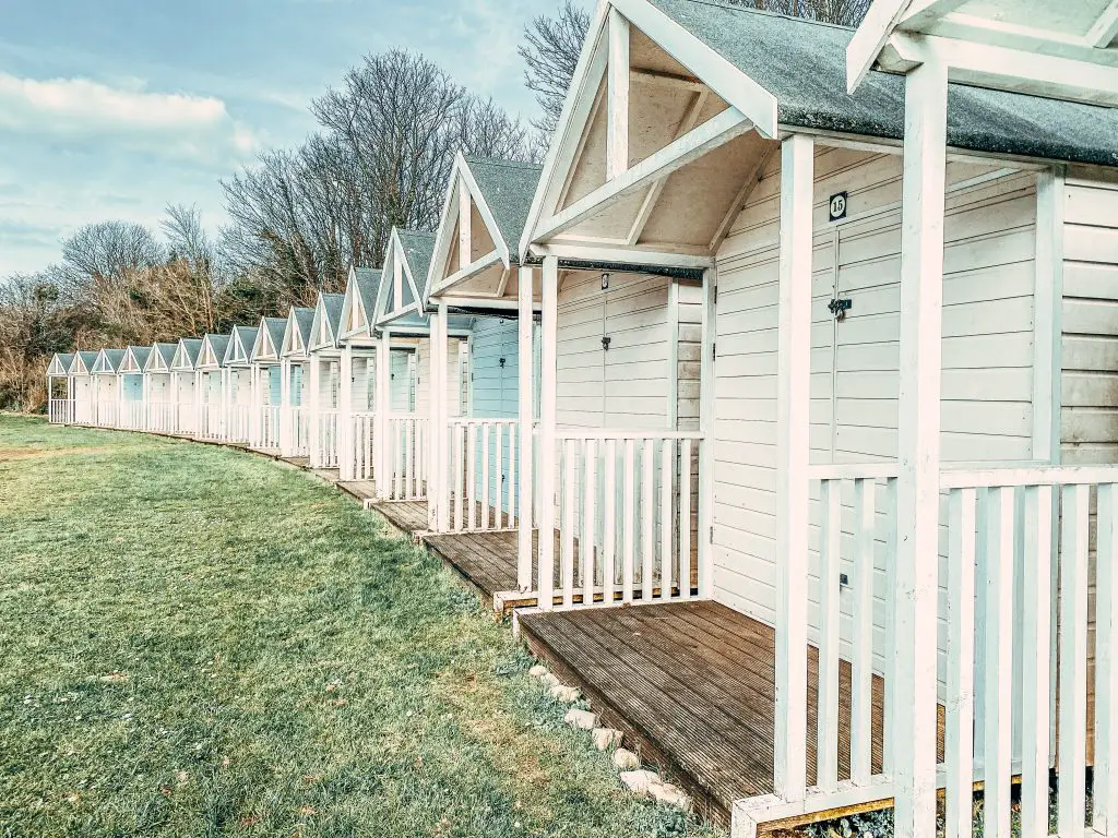 row of beach huts in Torbay